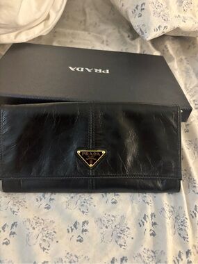Prada Black Leather Continental Wallet with Gold Triangular Logo